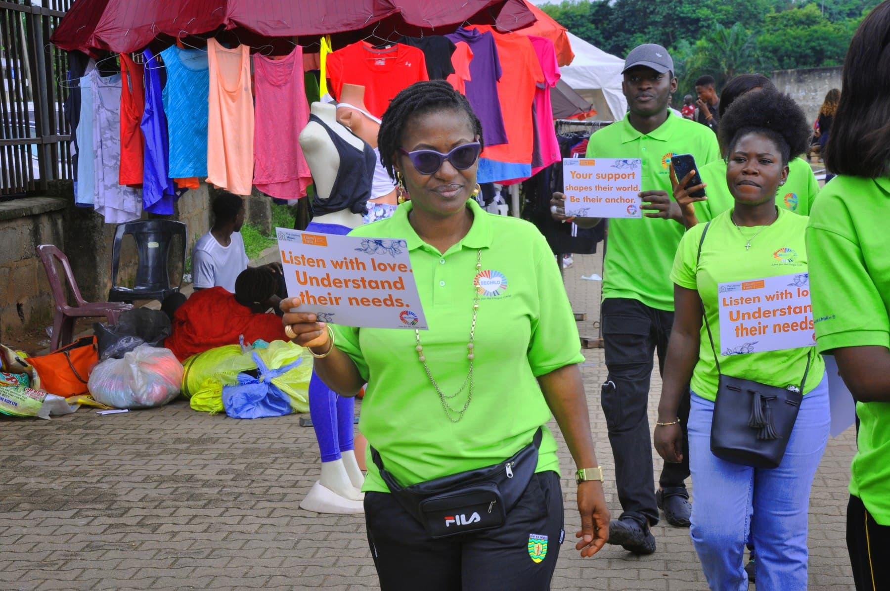 SECHILD staff and volunteers holding advocacy placards during an awareness walk