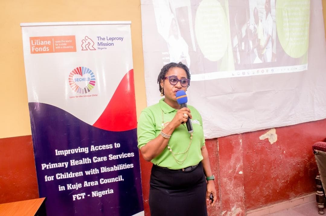A SECHILD staff member presenting on healthcare access for children with disabilities in Kuje Area Council